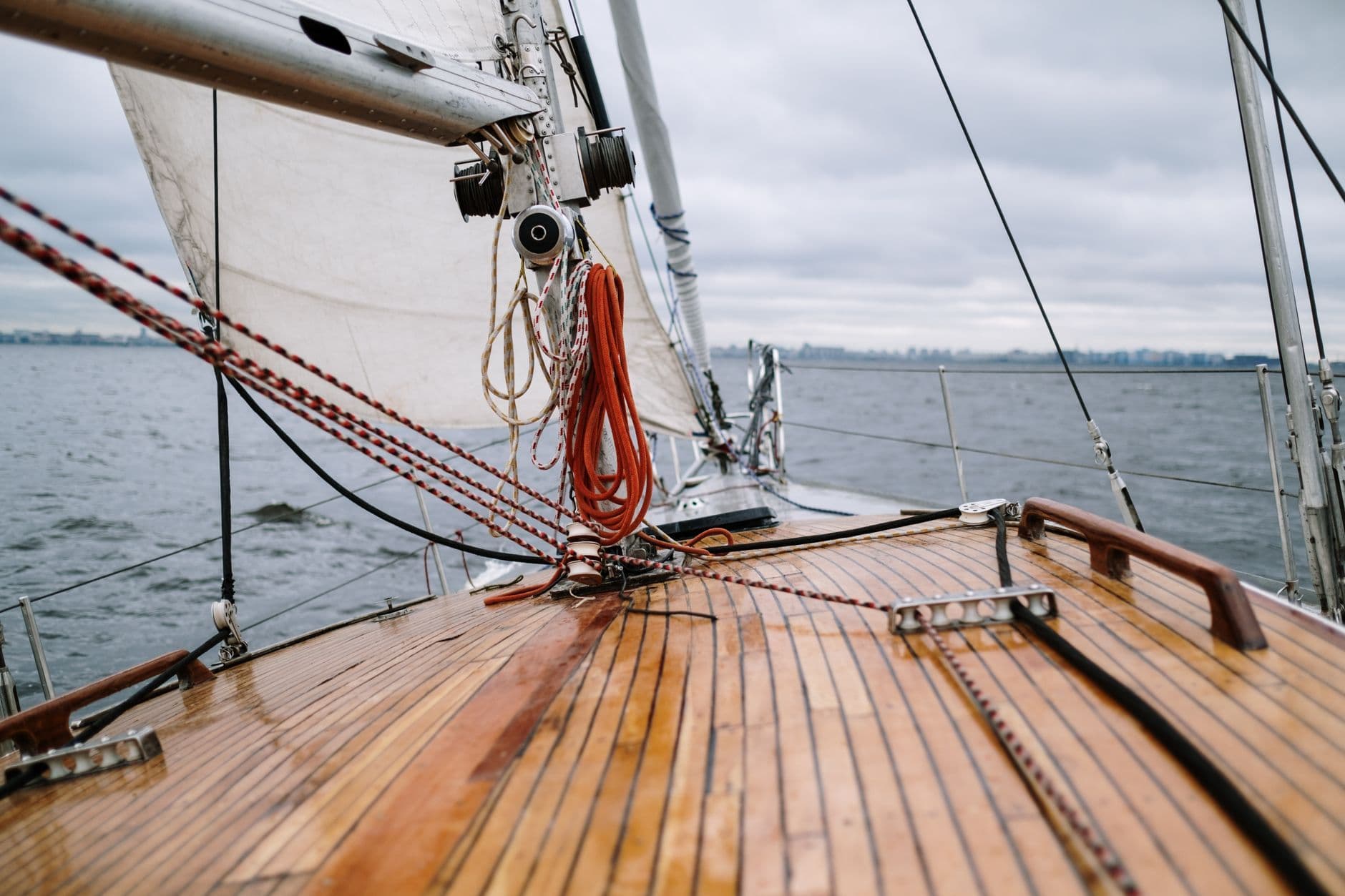 Wooden deck and rigging of a sailing yacht